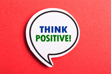 Think Positive Speech Bubble Isolated On Red Background