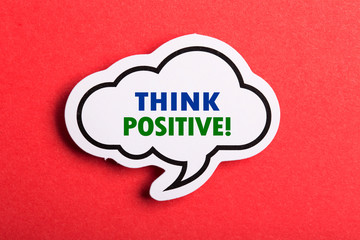 Think Positive Speech Bubble Isolated On Red Background