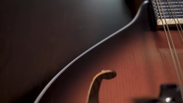 Passing over a tear drop Mandolin.