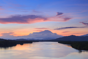 Fototapeta na wymiar Majestic Mount Kinabalu with beautiful Twilight Sunrise and amazing sky clouds, Tuaran,Sabah,Borneo (Soft Focus)