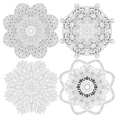 Hand drawn zentangle set of 4 mandalas for coloring page.
