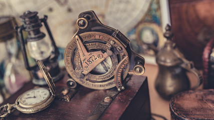 Fototapeta na wymiar Antique Nautical Sundial Compass Collection