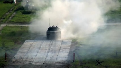 Russian military tank shoots and power of tank fires on military exercises in military industry and technology on forum army 2017 Polygon Alabino.