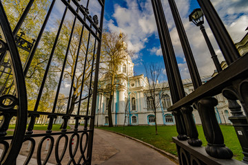 Smolny or Voskresensky Smolny monastery is located on Rastrelli square, on the banks of the Neva river in St. Petersburg, Russia, beautiful sky.