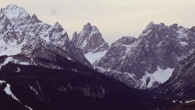 Italy, Dolomiti di Sesto (Dolomites of Sesto), aerial view of  Puster valley, Sesto houses, the Croda Rossa, the Croda dei Toni and the Tre Scarperi mountains  in winter