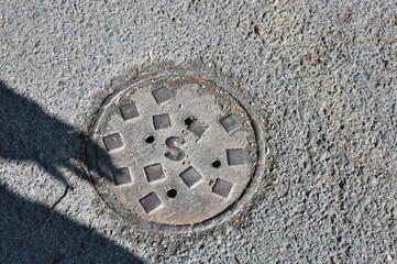Manhole and Shadow