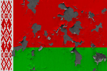 Close up grungy, damaged and weathered Belarus flag on wall peeling off paint to see inside surface.