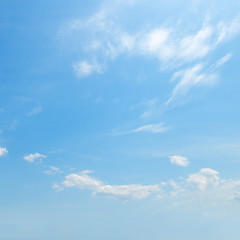 Light clouds in the blue sky.