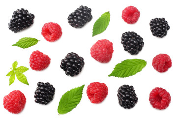blackberries with raspberries and green leaf isolated on white background. top view