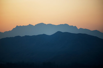 The misty peaks were at sunset