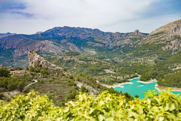 Fototapeta premium Panoramic view to beautiful landscape in mountain village Guadalest, Spain.
