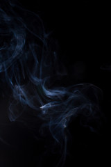 Smoke on a black background.