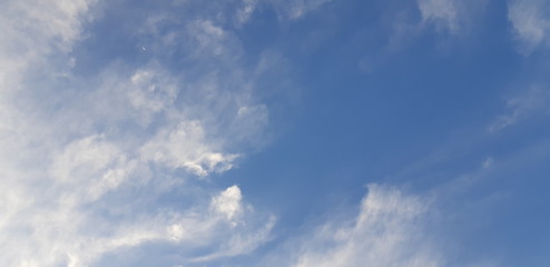 Naklejka na ściany i meble Blue sky and soft clouds