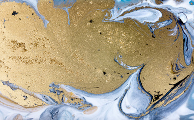 Obraz premium Blue marbling pattern. Golden marble liquid texture.