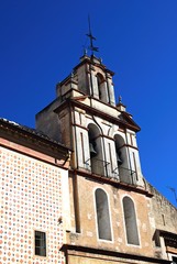 Fototapeta na wymiar Santa Maria la Blanca church bell tower in Santa Cruz district., Seville, Spain.