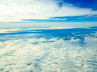 Naklejka na ściany i meble Background of Clouds of Sky seen from an airplane in height of cruise