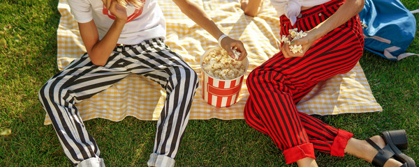 Happy Family Outdoors Having Fun Eating Popcorn Sunny Meadow