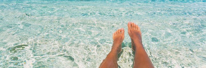 Relax feet beach vacation summer banner background - Woman relaxing on tropical travel destination...