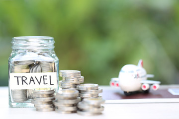 Search Photos By Monthira - saving planning for travel budget of holiday concept financial stack of coins money in