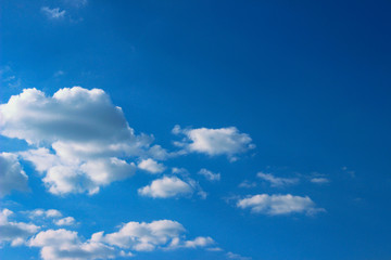 Naklejka na ściany i meble White Clouds Over Blue Sky Background. Nature, Landscape Concept. Beautiful Nature Background.