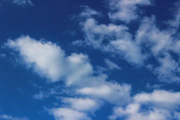 White Clouds Over Blue Sky Background. Nature, Landscape Concept. Beautiful Nature Background.