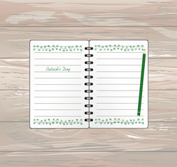 Notebook with template hand-drawn Green festive bunting with clover and pencil. Irish holiday - Happy St. Patrick's Day with a garland of three-leaf. Greeting card on holiday. Vector on wooden backgro