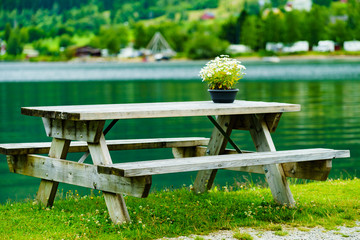 Rest stop area picnic site on fjord shore