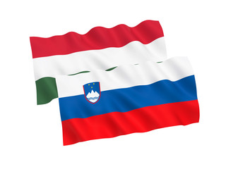 National fabric flags of Hungary and Slovenia isolated on white background. 3d rendering illustration. 1 to 2 proportion.