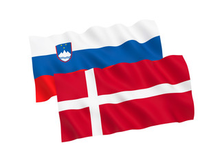 National fabric flags of Slovenia and Denmark isolated on white background. 3d rendering illustration. 1 to 2 proportion.