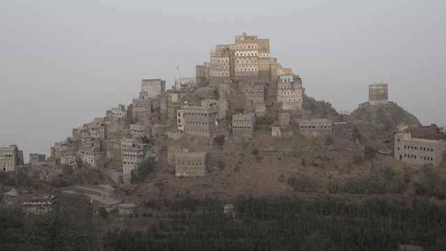 timelaps in Haraz Yemen during sunrise with people start doing their daily work like ants