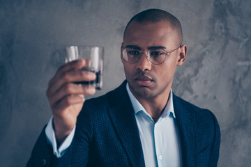 Blurred close up portrait attractive think thoughtful executive dream dreamy look beverage estimate serious focused short hair bald  person people modern outfit isolated dark background