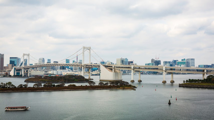 Obraz premium Rainbow Bridge and Tokyo Bay at Odaibacity, Japan.
