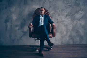 Portrait serious focused chairman boss executive manger cool confident sit brown furniture dream...