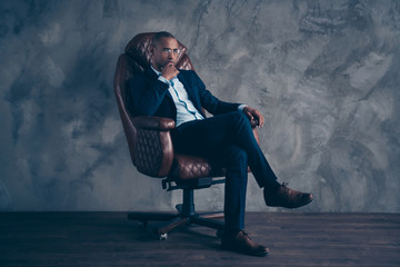Portrait concentrated finance financier pensive focused chief boss bald thoughtful worried  sit...