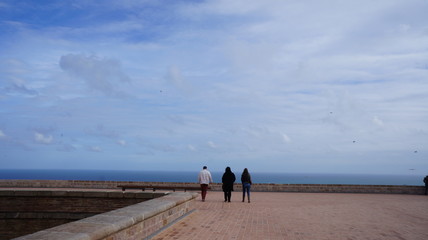 three people are walking