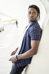Guy Afro-American handsome casual dress with dreadlocks. Concept of real and street people, photo style social networks © Rafa