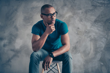 Close up photo amazing beautiful he him his dark skin macho sit comfy cozy chair hold arms hands...