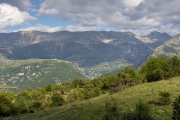 Fototapeta na wymiar The majestic mountains on a cloudy day (region Tzoumerka, Epirus, Greece)