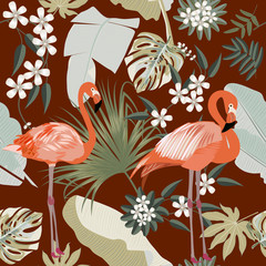 Seamless pattern of flamingo, leaves monstera. Tropical leaves of palm tree and flowers.