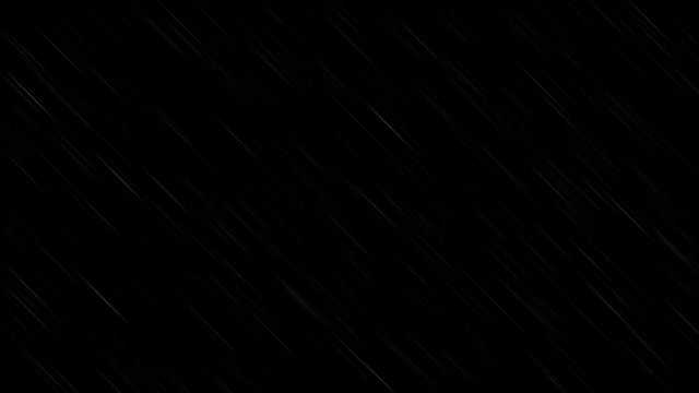 Cinematic image of rain during a strong wind.Rain Drops Falling on a black background.