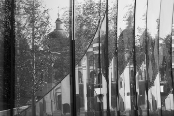 Sights of the city in the reflection of the Windows 
