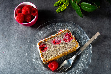 poppy seed cake with raspberries and grated coconut
