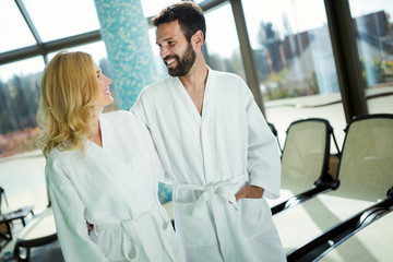 Portrait of attractive couple in spa center