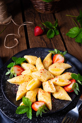 Kopytka - polish potato dumpling with strawberries