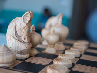 Thai wooden chess on checker board