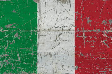 Grunge Italy flag on old scratched wooden surface. National vintage background.