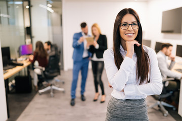 Portrait of successful beautiful businesswoman in office