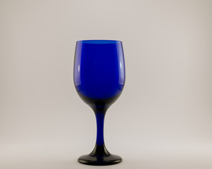 blue wine glass on white back ground