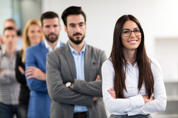 Portrait of business team posing in office