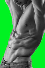 Muscle man poses sexy with shirtless torso, isolated on a green screen chrome key background.